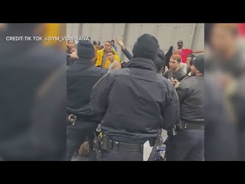 Migrants clash with cops during arrest [Video]