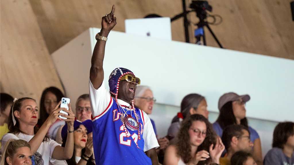 Flavor Flav is the hype man for the US women’s water polo team at the Olympics [Video]