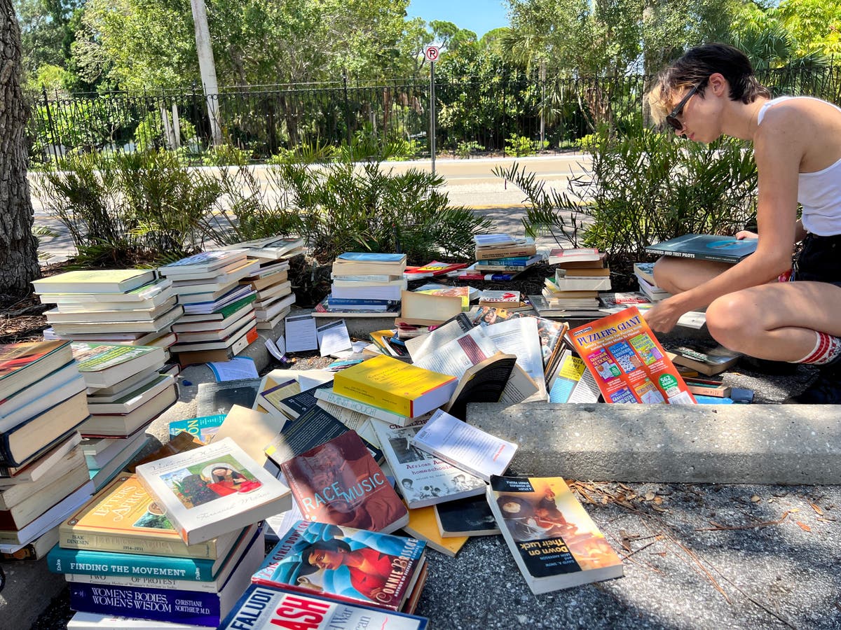 Heeps of books tossed in trash by Florida college – including many focusing on LGBTQ and race issues [Video]