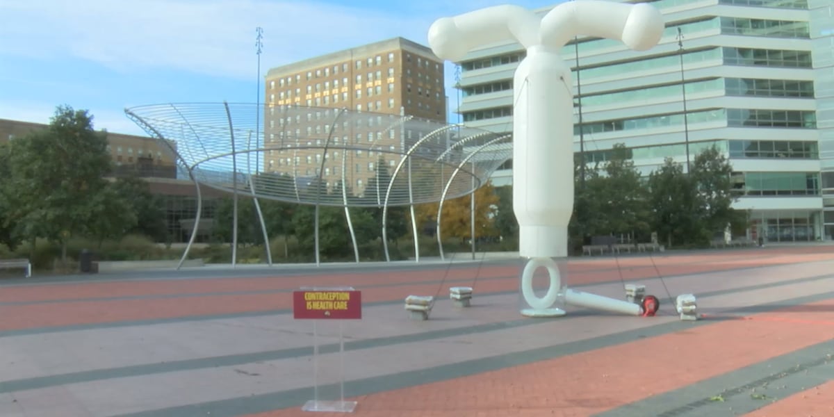 Giant inflatable IUD reappears, put candidates on alert about women’s issues [Video]