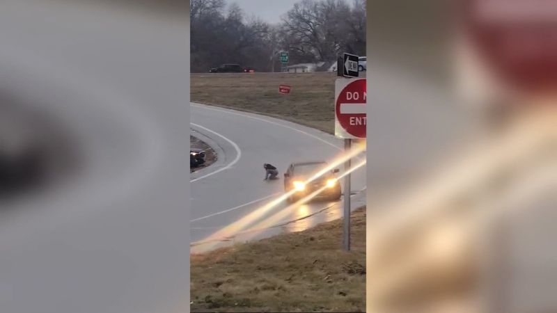 Driver bails from car sliding on black ice [Video]